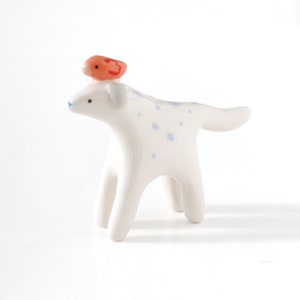 Dog and bird / Ceramic sculpture