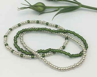 silver and dark olive green, matching bracelets,tiny bead bracelet