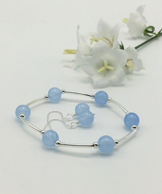 light blue bracelet with matching Malaysia jade earrings