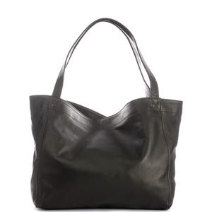 May include: Black leather tote bag with two shoulder straps. The bag has a simple, open top design and a spacious interior. The leather appears to be smooth and has a slight sheen. The bag is suitable for everyday use.