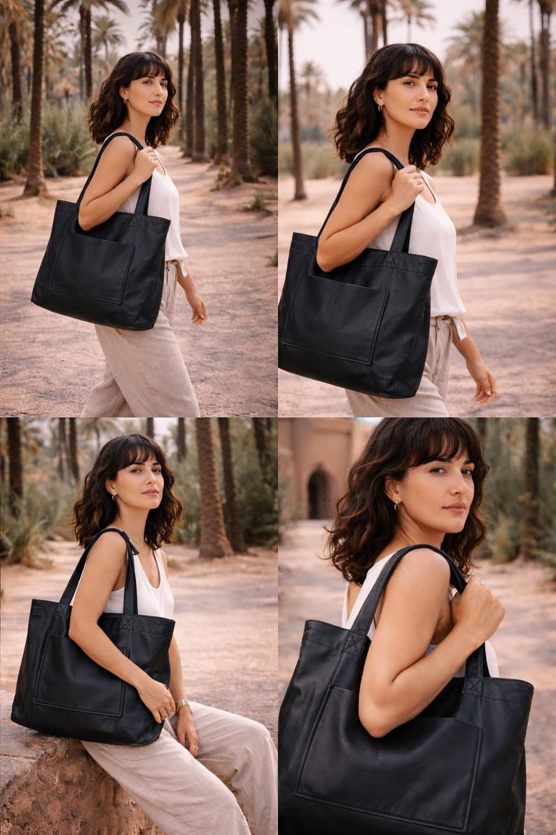 May include: A black leather tote bag with a front pocket and shoulder straps. The bag is rectangular and appears to be empty. The bag is being carried by a person in a white top and tan pants.