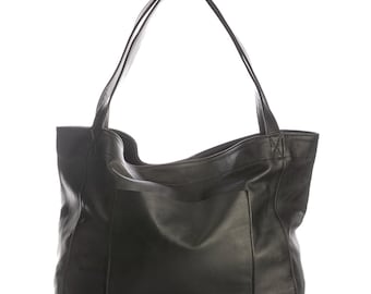 May include: Black leather tote bag with two long shoulder straps and a large exterior pocket. The bag has a simple, minimalist design and is made of a smooth, matte leather. The bag is suitable for everyday use.