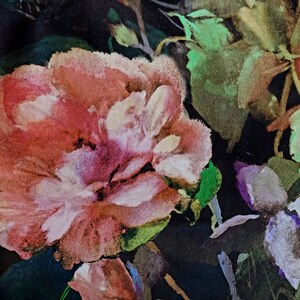 May include: A watercolor painting of pink and white flowers with green leaves on a black background.