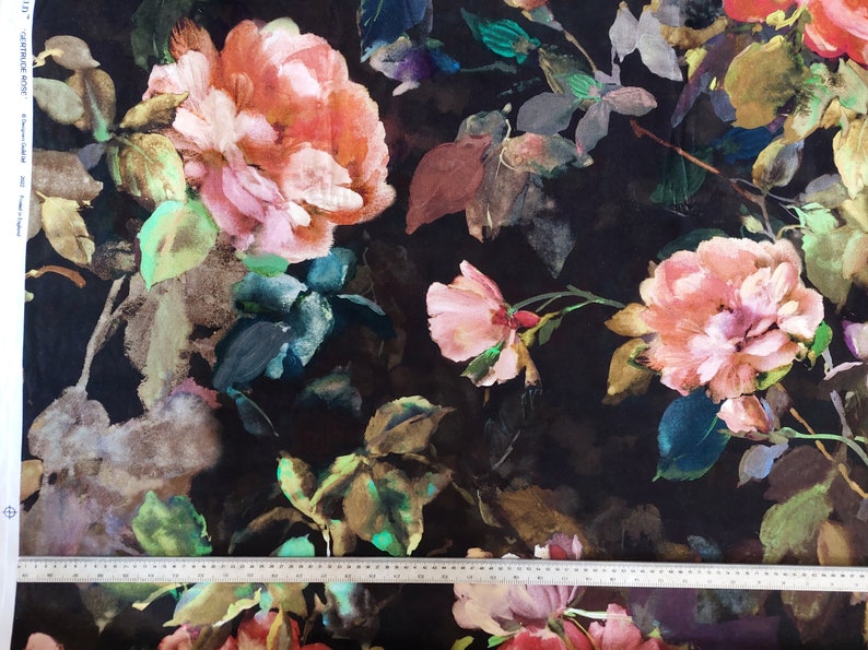 May include: Black fabric with a watercolor floral print featuring pink, orange, and green roses. The fabric has a dark background with a subtle sheen.