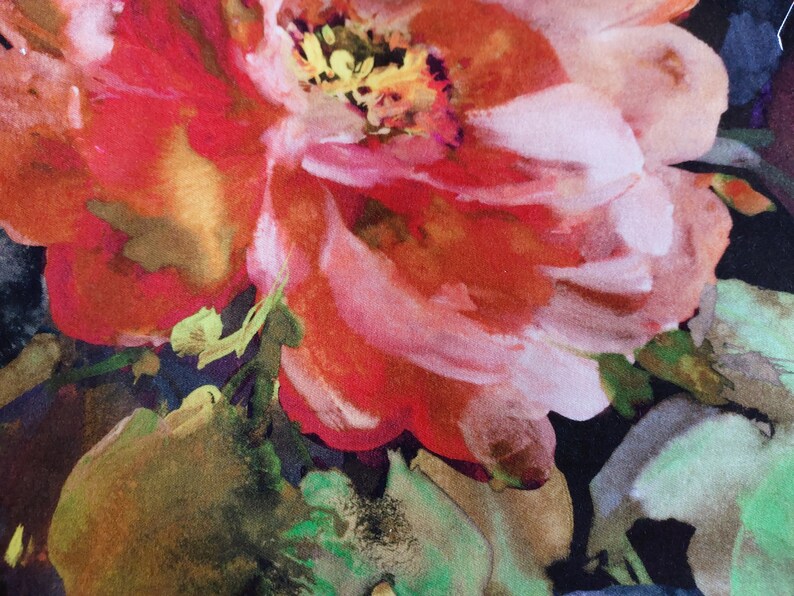 May include: A close-up of a watercolor painting of a large, red and pink flower with a yellow center. The flower is painted on a black background with other smaller flowers and leaves.
