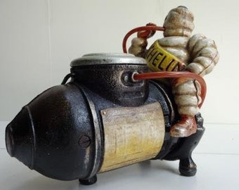 Vintage Style Cast Iron Michelin Man on Air Compressor Figure