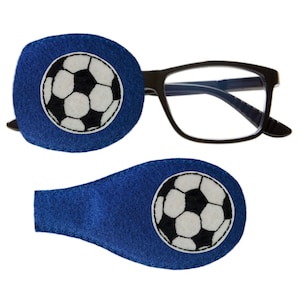 May include: A pair of blue eye patches with a football design. One patch is attached to a pair of black framed glasses.