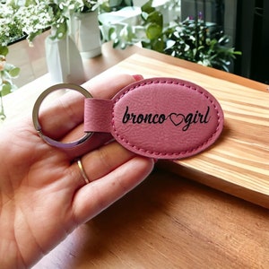 Bronco Girl Oval Leather Keychain - Purse Backpack Bag Accessories - Teal Cork Pink Purple Buck Buck Babe