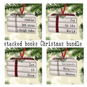 May include: Set of four white book-shaped Christmas ornaments with red and black plaid ribbon and red string. The ornaments feature the following text: "cookies hot cocoa sleigh rides", "Joy to the World", "Let it Snow", and "Have yourself a Merry little Christmas".