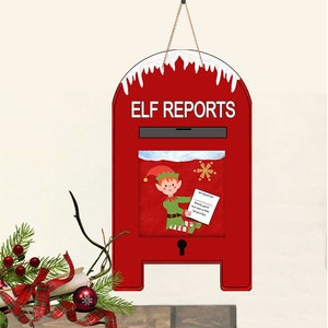 May include: A red wooden sign shaped like a mailbox, with the words "ELF REPORTS" in white. The sign features a cartoon elf holding a paper. The top of the sign has white icicle detailing. Christmas decorations include a green gift, red berries, and a green bauble.