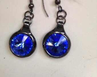 Boucles d’oreilles bleu Rivoli cristal avec monture en bronze