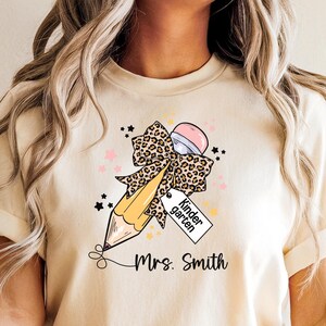 Kindergarten Teacher Pencil Bow Shirt, Funny Back to School T-Shirt, Gift for Educators, Kindergarten Teacher Apparel