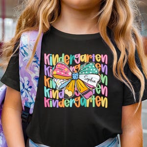 Kindergarten Girls Shirt, Custom Name Tee, Back to School Outfit, Personalized Preschool Shirt for Girls, Colorful Bow Design