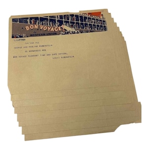 May include: A stack of vintage paper ephemera with the words "Bon Voyage" and "Western Union" printed on the top sheet. The image features a ship illustration and text including names and a location.