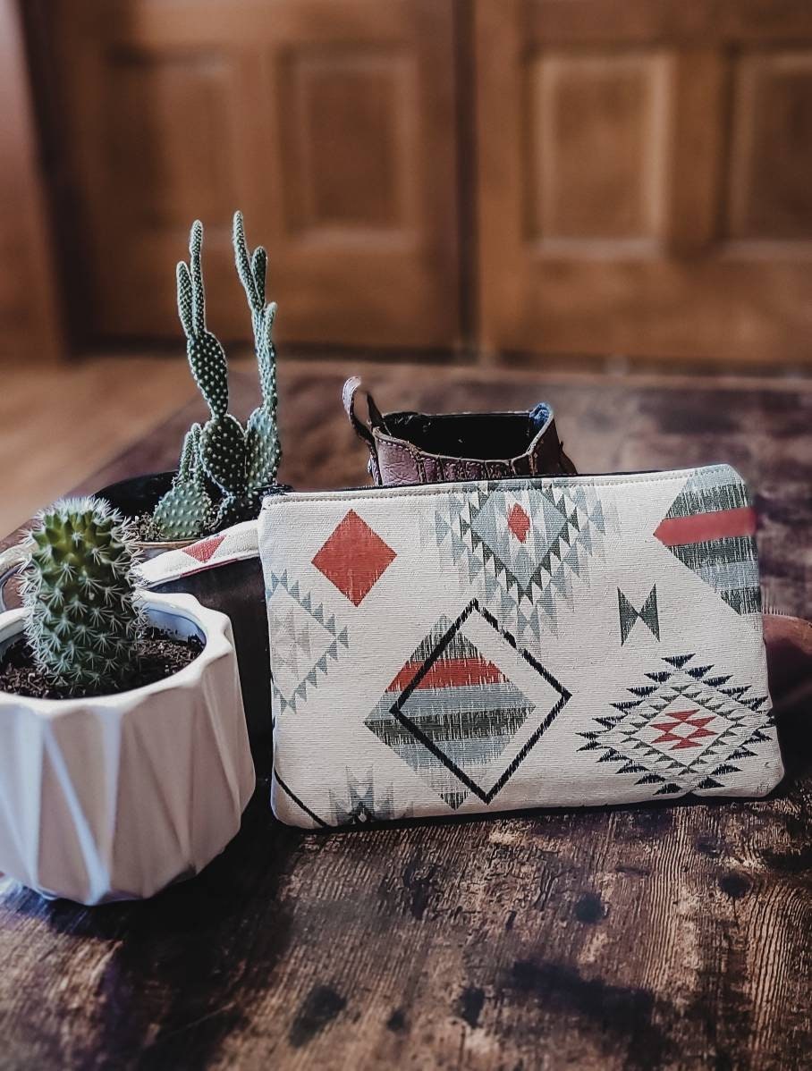 cream wristlet