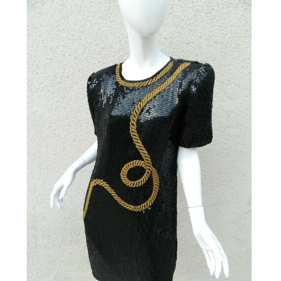 black and gold party frock