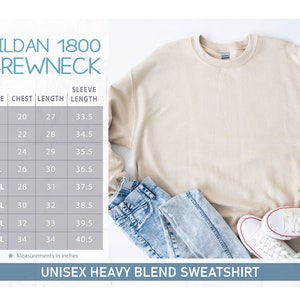 May include: A beige unisex heavy blend sweatshirt with a size chart showing chest, length, and sleeve length measurements in inches.