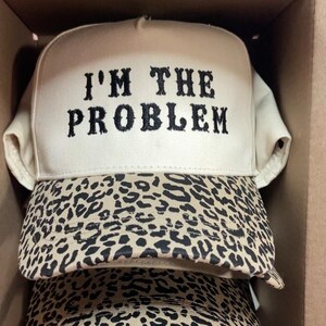 I’m the problem trucker hat, embroidered camo hat, 2 tone camo hat, camo problem hat, cute hat for concert, camo girl hat, trendy camo hat Leopard Brim
