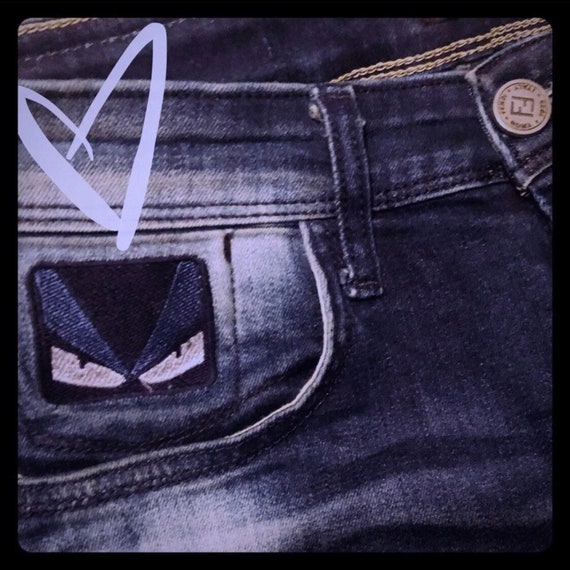 Vintage Fendi Distressed Monster Logo Skinny Jeans