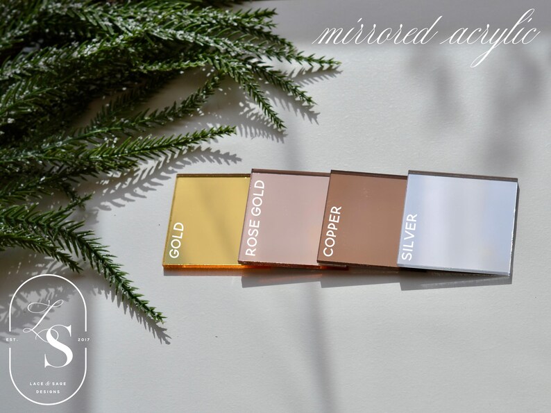 May include: Four mirrored acrylic sheets in gold, rose gold, copper, and silver. The sheets are arranged horizontally with the gold sheet on the left and the silver sheet on the right.