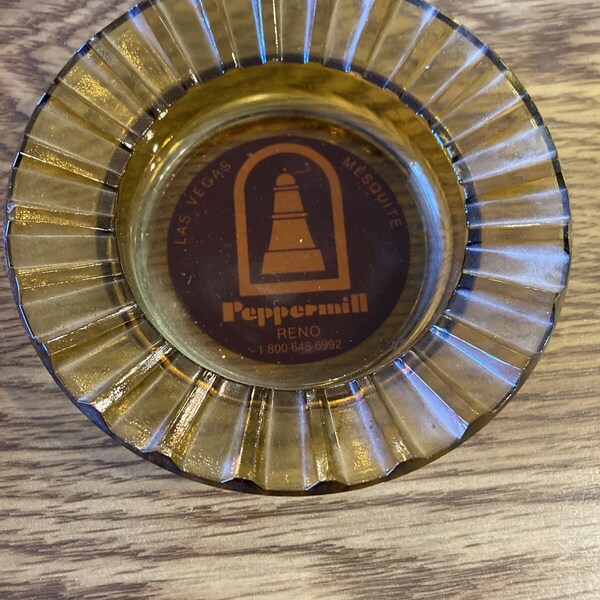 Vintage Ashtray THE PEPPERMILL Mesquite Reno Las Vegas 4-1/2" Amber glass