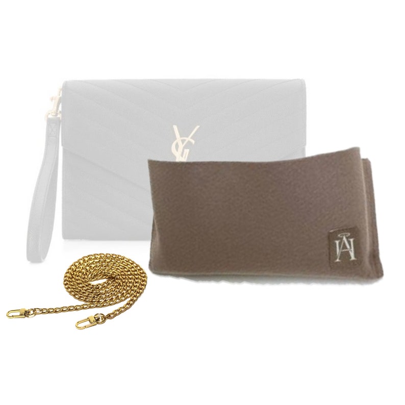 May include: A gray quilted leather clutch with a gold YSL logo and a gold chain strap. The clutch comes with a gray dust bag with the initials "IA" embroidered on it.