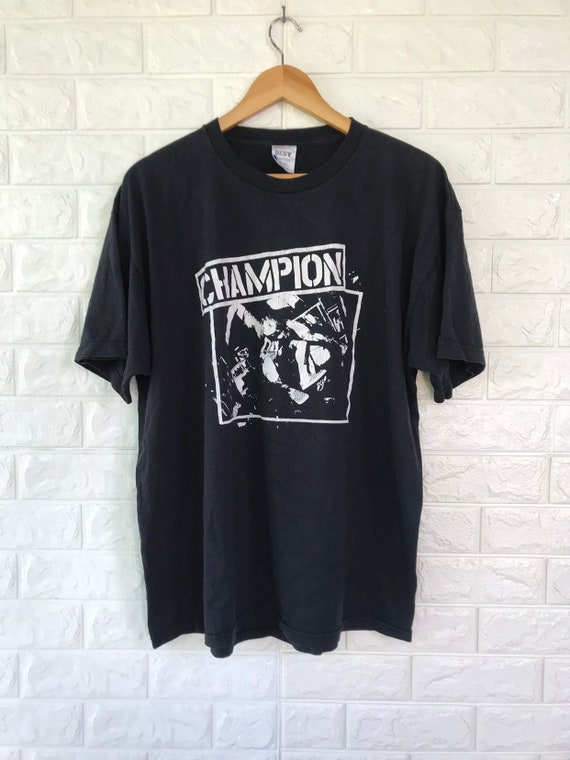 vintage champion ボロ Vintage 1950s Champion Running Man Boston University Tee