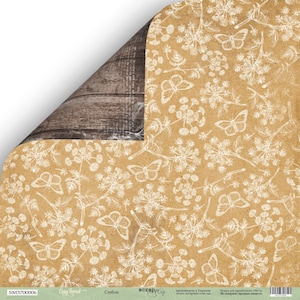 May include: A double-sided scrapbook paper with a rustic theme. One side features a brown wood grain pattern, while the other has a tan background with white butterfly and floral illustrations. The paper is ideal for crafting and scrapbooking projects.