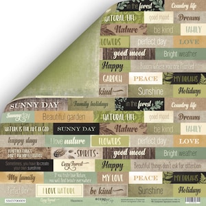 May include: A decorative paper sheet with a collage of text blocks in various colors and fonts. The text includes phrases like "Sunny Day," "Happy," "Nature," and "My Family." The overall theme suggests a scrapbook or craft paper with inspirational quotes.