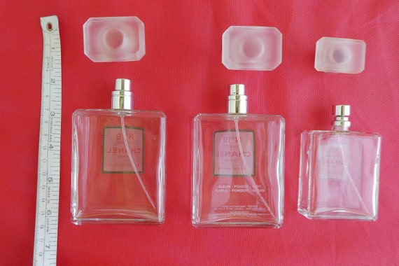 CHANEL No 19 Poudré. Three Empty Perfume Bottles. Large Glass