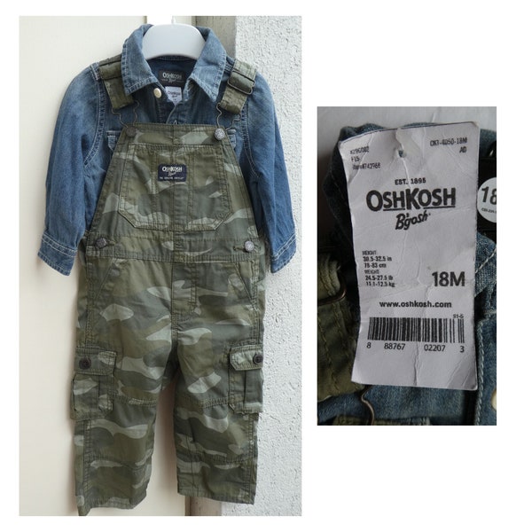 OSH KOSH USA – Salopette vert kaki / Chemise en jean bleue, 18 mois. Bretelles et bretelles, boutons signés, boutons-pression en métal. Salopette en coton.