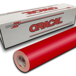 May include: A roll of red vinyl adhesive film, Oracal brand, in a white box with black lettering. The roll is wrapped in a clear plastic film.