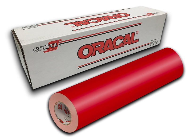 May include: A roll of red vinyl adhesive film, Oracal brand, in a white box with black lettering. The roll is wrapped in a clear plastic film.