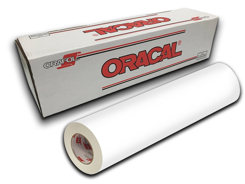 May include: A white roll of Oracal vinyl adhesive film, a popular brand for crafting and signage. The roll is on a white surface and is labeled with the Oracal logo in red.