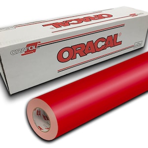 May include: A roll of red vinyl adhesive film, Oracal brand, in a white box with black lettering. The roll is wrapped in a clear plastic film.