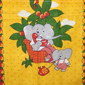 May include: A yellow tea towel with a red border and a red polka dot pattern. The towel features a cartoon illustration of two elephants, one on the phone, and a red bird on a green tree with red berries.