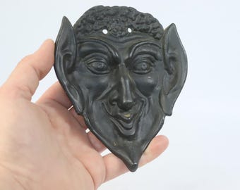 Heavy Soviet metal devil face without hornes. ashtray figurine devil. Vintage statuette, demon, Satan. Mephistopheles. wall decor devil