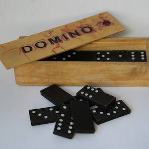 Vintage wooden dominoes. Vintage dominoes. Antique dominoes. old game. classic game. USSR game. Vintage game. old game. board game. Dragon