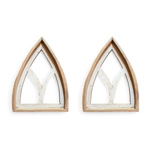 May include: Two wooden arched window frames with a white painted design. The frames are unfinished and have a rustic look.