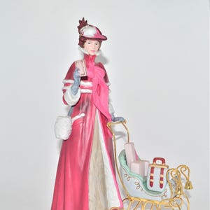 Avon 1989 Starr Presidents Club Mrs Albee Figurine - Lady with Sleigh NIB