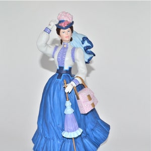 Avon 1996 Presidents Club Mrs Albee Figurine - Lady in Blue Dress