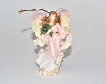 Seraphim Angel Classics - Noelle &quot;Giving Spirit&quot; First in the Annual Christmas Ornament Series #78159 1997 Roman Inc (5 over rose mark)