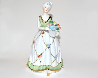 Vintage Porcelain Victorian Lady In White And Green Floral & Gold Accents Dress With Flower Basket Figurine Limoges 8 1/4"