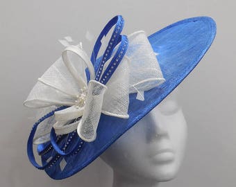 Blue hatinator, medium size disc in cobalt blue with large white bow, wedding hat, saucer hat, headband fascinator, feathers, race day