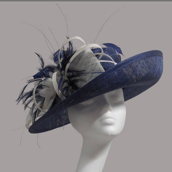 Beautiful navy & white medium ladies hat with feathers and sinamay. Weddings, races, ladies day or special occasion.