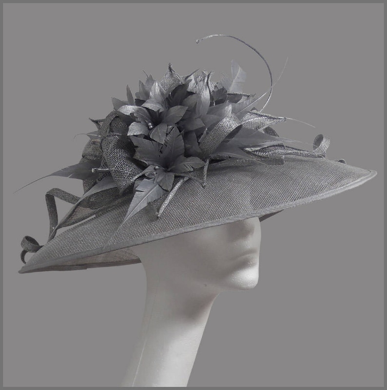 ladies day or special occasion. races Weddings feather flower /& diamant\u00e9 Stunning silver ladies hat with sinamay swirls