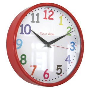 May include: A red circular wall clock with a white face and colourful numbers. The clock has black hands and a black border around the face. The text "ROCO VERRE" is printed on the face of the clock.