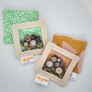 Zintuiglijk minispeelgoed: stukjes boom en rocailles voor kinderen