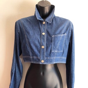 Mugler Trademark - Veste courte en denim bleu avec clous en métal argenté