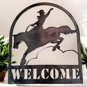 Welcome sign cowboy horse rodeo